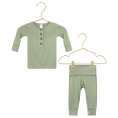 Good things come in pairs and our tops + bottoms are no exception. They’re made from our signature silky-soft material for a stretchy, comfy fit with functional buttons and fold-over waistband for room to grow (or to wear high-waisted). Say goodbye to socks that slip right off with built-in footies (on the newborn size only) to keep those tiny toes warm without the fuss. Unbelievably sweet mixing & matching approved. Sizes: *Newborn size only includes footies + fold over wrist cuffs Newborn-3 Month: 6-12 pounds // 18-22” long 3-6 Month: 12-16 pounds // 22-27” long 6-12 Month: 16-20 pounds // 26-30” long 12-24 Month: 20-30 pounds // 29-33” long 2T : 28-34 pounds // 32-37” long 3T : 33-38 pounds // 36-42” long 4/5 : 37-45 pounds // 40-45" long 6/7 : 44-55 pounds // 45-51" long Color: Sage Gr Best Pajamas, Lou Lou, In Pairs, Blue Gingham, Navy Blue Color, Grab Bags, Baby Grows, Comfy Fits, New Parents