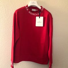 Grand New Moncler Red Round Neck Jumper Logo Sweatshirt. Size: Small Crew Neckline Long Sleeves With Logo Hem Hits Below The Hip. Pullover Style. Regular Fit Cotton Base. Wash Max 30c Shoulders: 19” Sleeve: 23” Breast: 20” Waterfall: 18” Length:65 “ Price Is Firm. Designer Red Long Sleeve Tops, Designer Long Sleeve Red Top, Designer Red Tops For Fall, Designer Red Crew Neck Top, Moncler Sweater, Logo Sweatshirt, Pullover Styling, Crew Neckline, Scoop Neck