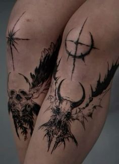 the legs are decorated with tattoos and designs