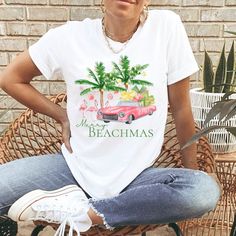 This Merry Beachmas Christmas shirt is a perfect beach Christmas shirt for anyone enjoying a coastal Christmas . A pink flamingo palm tree tee is a perfect Xmas gift for a beach lover. Wear this cute Christmas tee throughout the holiday season. ▶︎ If you prefer this Xmas tshirt to have a more oversized look, such as the model is wearing in the dark grey heather color, go up 1 to 2 sizes depending on how oversized you want. This unisex tee fits like a well-loved favorite. Super soft cotton and excellent quality print makes this one to fall in love with it over and over again. 🌴 Shirt colors dark grey heather and heather ice blue are a soft cotton blend - 52% cotton, 48% poly 🌴 Shirt color white is 100% soft cotton 🌴 Runs true to size - unisex sizing View more Christmas shirts here: https Christmas At The Beach Shirts, Palm Tree Christmas, Hawaii Christmas, Christmas Cruise, Christmas Dress Up, Christmas Cruises, Florida Christmas, Coastal Christmas Decor, Beach Clothes