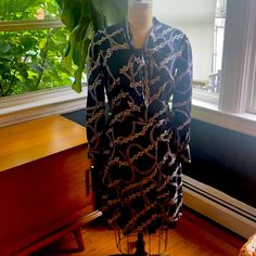 This Is A Unmarked Vintage Item - Most Likely Handmade Purchased In Venice, Italy In A High End Vintage Store. The Size Is Approximately A Us8 But I Can Give More Precise Measurements If You Are Interested. It’s Fabulous Vintage Dress In Superb Condition. The Print Is Reminiscent Of The Herms And Chanel Chain Link Prints. Pleated Side Panels In Skirt. Back Zip & Hook & Eye Closure. Collar Bow Tie At Nape. Double Button Sleeves. It Has Been Professionally Dry Cleaned And Never Worn By Me. Elegant Fitted Dress With Chain Print, Elegant Black Dress With Chain Print, Chic Fitted Dress With Chain Print, Chanel Chain, Mad Men Fashion, Bow Tie Collar, Size 8 Dress, Vintage Store, Mad Men