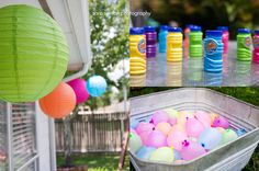 there are many different colored lanterns in the yard