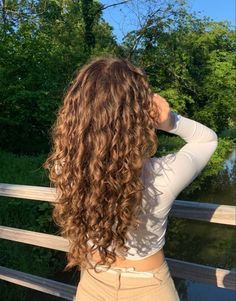 Partial Highlights For Brunettes Curly Hair, Long Curly Haircuts Face Framing, Brown 2c Hair, Money Piece Balayage Curly Hair, Long Layers With Face Framing Pieces Wavy Hair Curly, Layered Curly Hair With Curtain Bangs, Curly Hair Heart Shaped Face, Curly Layers Long, Long Permed Hairstyles