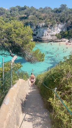 people are swimming in the blue lagoons at pliti beach