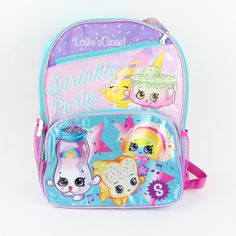 Shopkins 16 In. Backpack This Shopkins 16-In. Backpack Has A Front Zipper Pocket And Mesh Side Pockets. Fun Bright Colors For Sprinkle Party Fun! * 100% Polyester * Imported * Hand Wash * Front Pocket; Side Sport Mesh Pocket * Padded Adjustable Shoulder Straps * Backpack Measures 16 Inch Height X 12 Inch Width X 5 Inch Depth Playful Purple Backpack, Purple Backpack For Playtime And Back To School, Purple Backpack For School Events, Fun Purple Back To School Bag, Cute Purple Standard Backpack, Cute Standard Purple Backpack, Cute Purple Backpack, Sprinkle Party, Party Fun