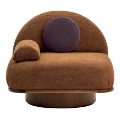 a brown chair with a purple circle on it's back and armrests