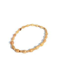 Our fragrant Palo Santo bead necklace is hand carved and very aromatic. The beads are strung on a stretchy cord and are designed to fit over the head. The large beads measure approximately 14 mm in diameter. Crafted in Peru. Large Beads, Bead Necklace, Peru, Choker, Hand Carved, Beaded Necklace, Carving, Beads, Santos