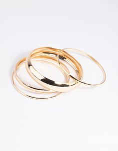 Mix them, match them, stack them! This adorable bangle pack includes fine and chunky bangles for a layered look. Wear them all at once for maximum impact! Weight: 61.4g | Lovisa Gold Thick & Thin Bangle Bracelet 4-Pack Chunky Bangles, Bracelet Pack, Huggie Hoop Earrings, Favorite Rings, Mixed Metals, Layered Look, Ring Necklace, Bangle Bracelet, Rose Gold Ring