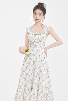 Sultry and feminine daytime tea dress that will have heads turning. Features a square neckline with lace adorned straps, basque waistline accentuated with self-tie straps, and a midaxi skirt with lace hem. Concealed back zipper. S: 33" chest, 26.5" waist, 47" lengthM: 34.5" chest, 28" waist, 47" lengthL: 36" chest, 29.5" waist, 47.5" lengthXL: 37.5" chest, 31" waist, 47.5" length Dresses With Lace Trim And Fitted Bodice, Dresses With Lace Trim, Fitted Bodice, And Straight Neckline, Spring Midi Dress With Lace Trim And Sweetheart Neckline, Summer Midi Dress With Lace Patchwork For Daywear, Lace Dress With Tie Back And Sweetheart Neckline, Garden Party Dress With Lace-up Back And Spaghetti Straps, Midi Dress With Lace Trim And Fitted Bodice, Fitted Midi Dress With Lace Trim And Square Neck, White Corset Dress With Straight Neckline For Summer