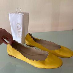 100% Authentic. Previously Loved But In Good Condition. Chloe Lauren Scalloped Leather Ballet Flats/Shoes With Dust Bag. Size: 8.5-9 Us/ 39 Italy Color: Yellow Insole Length: 10”- 25.5 Cm Heel: 0.3” Signature Scalloped Collar.Smooth And Supple Leather Leather Lining And Sole. Padded Footbed Slip-On Style . Round Toe. Very Clean Inside. Imperfection: On Both Shoes, Outside Surface Dark Discoloration. See My Last Photo. Due To Pandemic All Sales Are Final. Please Review Photos And Ask Questions. Photos/ Video Will Be Taken Prior To Shipping To Avoid Any Accusations Or Damages Scalloped Collar, Chloe Shoes, Flats Shoes, Leather Ballet Flats, Ballet Flat Shoes, My Last, Ballet Flats, Chloe, Dust Bag