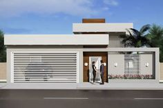 two people are standing in front of a modern house with shutters on the doors