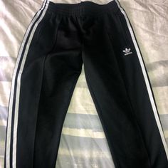 Worn A Few Times, Just Do Not Fit Anymore. Look Brand New! No Rips Holes, Stains, Pilling, Or Tears. Smoke Free Home. Black Cotton Bottoms With Three Stripes, Stretch Black Sweatpants With Three Stripes, Black Stretch Sweatpants With Three Stripes, Fitted Adidas Pants With Three Stripes Branding, Adidas Fitted Bottoms For Streetwear, Adidas Fitted Pants For Streetwear, Adidas Casual Black Bottoms, Fitted Black Adidas Pants, Adidas Fitted Sweatpants