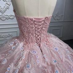 Stun your invitees with this exquisite pink quinceanera ball gown, designed with a fitted bodice and sweetheart neckline, complete with a generous skirt and slight train, and a lacing system in the back for a customised fit. Lavish accents are featured with a patterned top and lace overlay, all adorned with delicate purple flowers. material: organza color: as shown type: party ball gown sweetheart neckline sleeveless lace up back shown as size 2 original photos Quinceanera Ball Gown For Prom Season, Princess Style Ball Gown Quinceanera Dress For Prom, Pink Wedding Dress With Fitted Bodice For Prom Season, Fitted Wedding Dress For Quinceanera, Prom Season Quinceanera Dress With Fitted Bodice For Pageant, Quinceanera Ball Gown Dress With Fitted Bodice For Prom, Quinceanera Dress For Prom Season With Fitted Bodice, Princess Style Quinceanera Dress For Prom, Pink Sweetheart Neckline Ball Gown For Debutante Ball