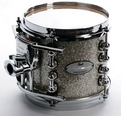 a close up of a snare on a drum with silver sparkles and chrome hardware