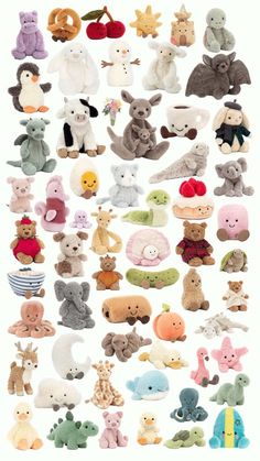 a large collection of stuffed animals sitting next to each other