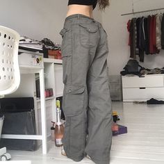 Step up your street style with these vintage-inspired baggy cargo pants for women. made with a blend of cotton and polyester, these low waist pants offer a comfortable fit and a unique urban look. get ready to make a bold fashion statement with these stylish cargo pants! Cargo Pants Women Baggy, Patchwork Trousers, Y2k Cargo Pants, Streetwear Cargo Pants, Hip Hop Trends, Fairycore Clothes, Women Cargo Pants, Baggy Cargo Pants, Streetwear Jeans