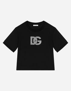 Jersey T-shirt with rhinestone logo: Black Oversize fit Round neck Fusible rhinestone DG logo on front Short sleeves The item in the size 6 years measures 42 cm from the shoulder seam Made in Italy The difference in the print placement that you may find on this product is a feature of Dolce & Gabbana’s “Handmade” pieces. A detail that makes every garment or accessory unique and exclusive. Black Embellished Cotton T-shirt, Black Crew Neck T-shirt With Rhinestones, Black Cotton T-shirt With Rhinestones, Dg Logo, Latest T Shirt, Black Jersey, Logo Black, Kids Fashion Girl, Accessories Unique