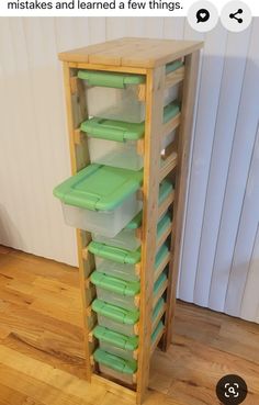 a wooden shelf filled with plastic containers on top of a hard wood floor