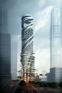 a very tall building with a spiral design on it's side in the middle of a city