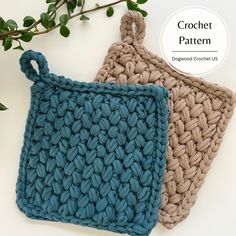 two crochet potholders sitting next to each other