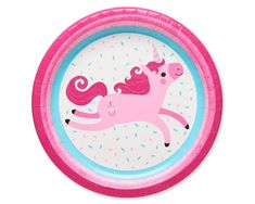 a pink unicorn paper plate with sprinkles on it