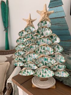 a christmas tree made out of bowls on a table