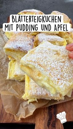 a person is holding onto some food on a cutting board with the words blattereighucken mit pudding und apeel