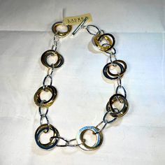 Entwined Silver And Gold Tone Circles And Links Necklace, 18”. New With Tags. Silver Metal Chain Necklace For Anniversary, Ralph Lauren Jewelry, Chunky Choker, Beaded Collar Necklace, Faceted Bead Necklace, Mesh Necklace, Turquoise Pendant Necklace, Toggle Necklace, Gold Long Necklace