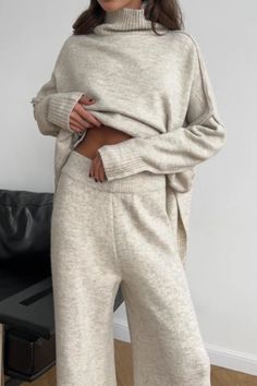 Stay effortlessly chic and cozy with our Slouchy Loose Knit Turtleneck Sweater & Wide Leg Pant Set. This two-piece ensemble is designed for ultimate comfort and style, making it the perfect choice for those laid-back days or casual outings.The slouchy turtleneck sweater features a loose, relaxed fit that drapes beautifully, with a soft knit texture that keeps you warm without feeling bulky. The oversized silhouette adds a touch of effortless elegance, while the cozy turtleneck gives you extra wa Soft Outfits, Mommy Fashion, Christmas Staircase, Sweater Sets, Loungewear Outfits, Comfy Sets, Wear A Scarf, How To Wear A Scarf, College Outfit