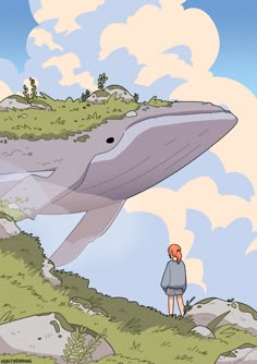 a man standing on top of a lush green hillside next to a giant gray whale