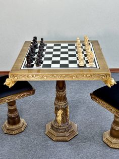 a chess table with two chairs around it