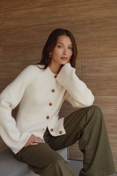 The Averie Cardigan boasts wooden buttons and a wool cashmere blend for a luxurious feel. Its super soft material combined with long bell sleeves and a flattering silhouette make it a must-have for both comfort and style. Upgrade your wardrobe with this elegant piece. Elegant Button-up Cashmere Sweater, Elegant Cashmere Button-up Sweater, Elegant Cashmere Sweater With Button Cuffs, Chic Button-up Cashmere Sweater, Chic Cashmere Button-up Sweater, Elegant Cashmere Cardigan With Button Cuffs, Long Sleeve Cashmere Cardigan With Buttons, Cashmere Cardigan With Buttons For Work, Timeless Cashmere Sweater For Fall