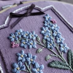 a close up of a piece of cloth with flowers on it