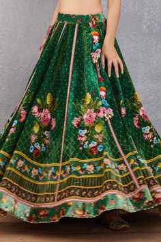 Emerald green lehenga with multi-color floral motif print, striped pattern and kamar tassel detail. Comes with plunging neck blouse and fringe border dupatta.
Component: 3
Printed
Neckline: Sweetheart
Sleeve Length: Cap
Fabric: Blouse and Lehenga: Velvet, Cotton Silk; Lehenga: Dupion; Dupatta: Net and Cotton Silk
Color: Green
Kamar latkans
Tie-up back
Fringe dupatta - Aza Fashions Green Silk Bohemian Sharara, Green Bohemian Silk Sharara, Bohemian Green Silk Sharara, Bohemian Green Choli With Cutdana, Green Bohemian Choli With Cutdana, Bohemian Green Sharara For Reception, Green Bohemian Choli With Pallu, Green Bohemian Choli With Dupatta, Bohemian Green Choli With Dupatta