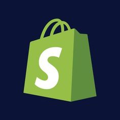 a green shopping bag with the letter s on it's front and bottom corner