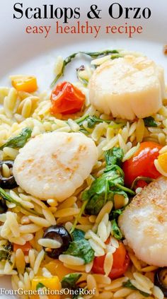 scallops and orzo with vegetables on a white plate