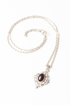 A beautiful sterling silver vintage Norwegian necklace with an oval red stone probably agate, looks stunning under the light. It would be a wonderful gift for someone special. Hallmarked: 830S for Norway, Sterling Silver. Hallmarked 830 S NMF Weight: 6.2 grams Pendant Length: 2.5cm Pendant Width: 1.5cm Chain Length: 22cm Gift Oval Cabochon Necklace With Polished Finish, Vintage Hallmarked Oval Cabochon Necklace, Formal Engraved Necklace With Oval Cabochon, Formal Engraved Oval Cabochon Necklace, Ornate Sterling Silver Oval Pendant Necklace, Classic Sterling Silver Necklace With Oval Cabochon, Ornate Oval Pendant Necklaces For Formal Occasions, Ornate Oval Pendant Necklace For Formal Events, Victorian Oval Link Necklaces As Gifts