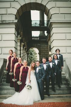 a group of people that are standing on some steps