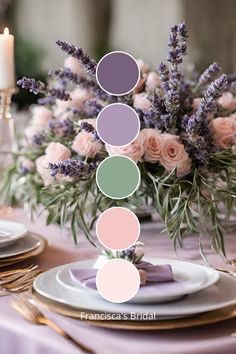 the table is set with plates, silverware, and flowers in pastel shades