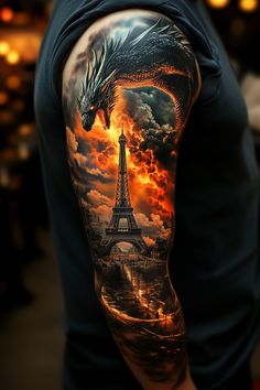 a man with a dragon tattoo on his arm next to the eiffel tower