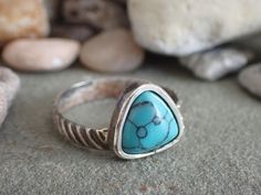 This turquoise ring is made from all sterling silver. The trillion/triangular shaped blue turquoise is set in a sterling silver bezels. The ring fits a 7.25 US. READY TO SHIP! Wide Silver Band, Ring Fit, Christmas Wishlist, Blue Turquoise, Ring Silver, Turquoise Stone, Silver Band, Rings Statement, Turquoise Ring