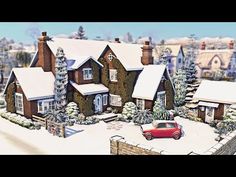 a red car parked in front of a snow covered house