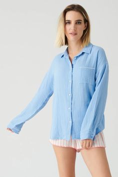 Stay comfortable and stylish in this lightweight and breathable 100% cotton gauze summer long-sleeve top and short set. The top features contrast stitching on the front pocket and embroidery on the back stating, "Live In The Moment." Gauze Top, Blue Long Sleeve Tops, Live In The Moment, Womens Loungewear, Short Set, Pj Sets, Contrast Stitch, Bright Blue, Up Styles