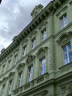 an old building with many windows on it