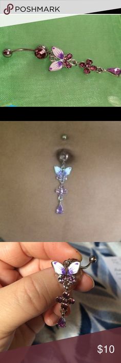 NWOT Butterfly Belly Ring Stainless Steel and Rhinestone (purple/pink) dangly belly ring. The bar diameter is 1.6mm and the total length is about 68mm with the bar being 10mm.  This is a very pretty and feminine belly button ornament Jewelry Unique Purple Jeweled Dangle Jewelry, Purple Dangle Rhinestone Jewelry, Purple Belly Ring, Purple Rhinestone Dangle Jewelry, Belly Button Rings Butterfly, Adjustable Purple Rhinestone Jewelry, Nickel-free Pink Belly Rings As Gift, Adjustable Nickel-free Pink Belly Rings, Adjustable Nickel-free Dangle Belly Rings