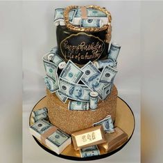 a cake made to look like money is on display