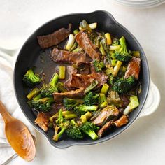 beef and broccoli stir fry in a skillet