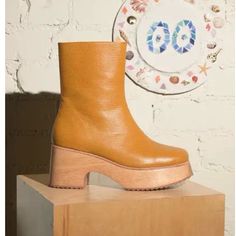 Charlotte Stone Women's Isla Leather Low 2.75-Inch Heel Platform Clog Boots, Caramel New In Box With Gift Tote! A Brand-New, Wear-Everyday Clog Boot. Uppers With Clean Welted Leather Or Woven Tapestry Fabric From Spain, A Squared Toe, And Low 2.75" Heel (With 1.25" Platform). We Wouldn't Mind Being Stranded On This Island. About Charlotte Stone: We’re Your Attentive Plus One, Your Best Friend, Your Favorite Person And Always The Life Of The Party Charlotte Stone Stands For All Caps Fun Which To Charlotte Stone, Shoes Stylish, Clog Boots, Gift Totes, Platform Clogs, Woven Tapestry, Tapestry Fabric, Tapestry Weaving, Platform Boots