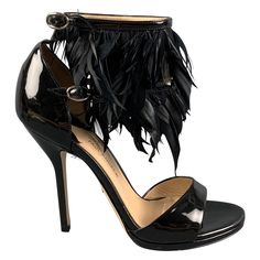 PAUL ANDREW sandals comes in a black patent leather featuring a double feather strap design, open toe, and a stiletto heel. Made in Italy. New Without Tags. Marked: 36 Measurements: Heel: 4.5 inches Reference: 120965 Category: Sandals More Details Brand: PAUL ANDREW Size: 6 Color: Black Material: Feathers Type of Leather: Patent Leather Style: Ankle Strap Condition: New without Tags Age Group: Adult Gender: Female Strap Sandals Heels, Ankle Strap Sandals Heels, Strap Design, Black Patent Leather, Ankle Strap Sandals, Stiletto Heel, Strap Sandals, Black Shoes, Patent Leather