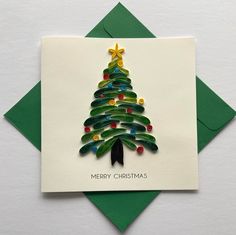 a card with a christmas tree on it